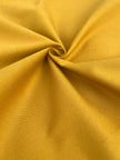 Tissu en coton épais adouci jaune moutarde par cour 400/m2 - Rembourrage de style français - Tissus d'ameublement naturels. %100 Coton - 150 cm de largeur. Gabardine de coton.